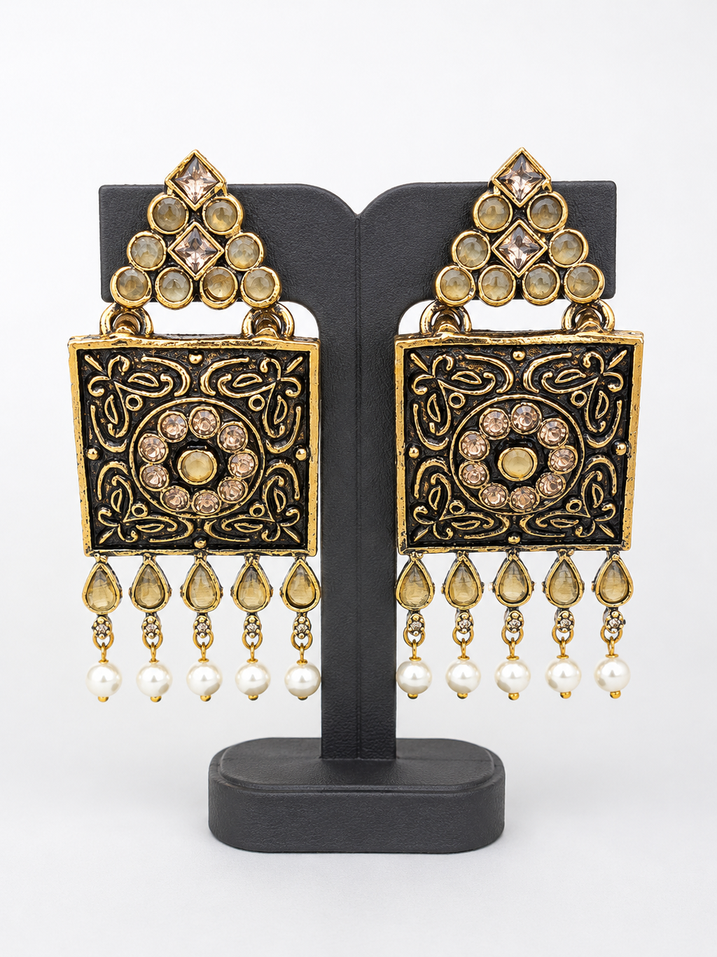 Antique-gold square earrings with black panels and five pearl-style drops