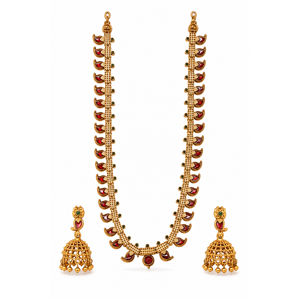 Long gold-tone necklace set with red mango motifs, green accents and matching jhumka earrings on white