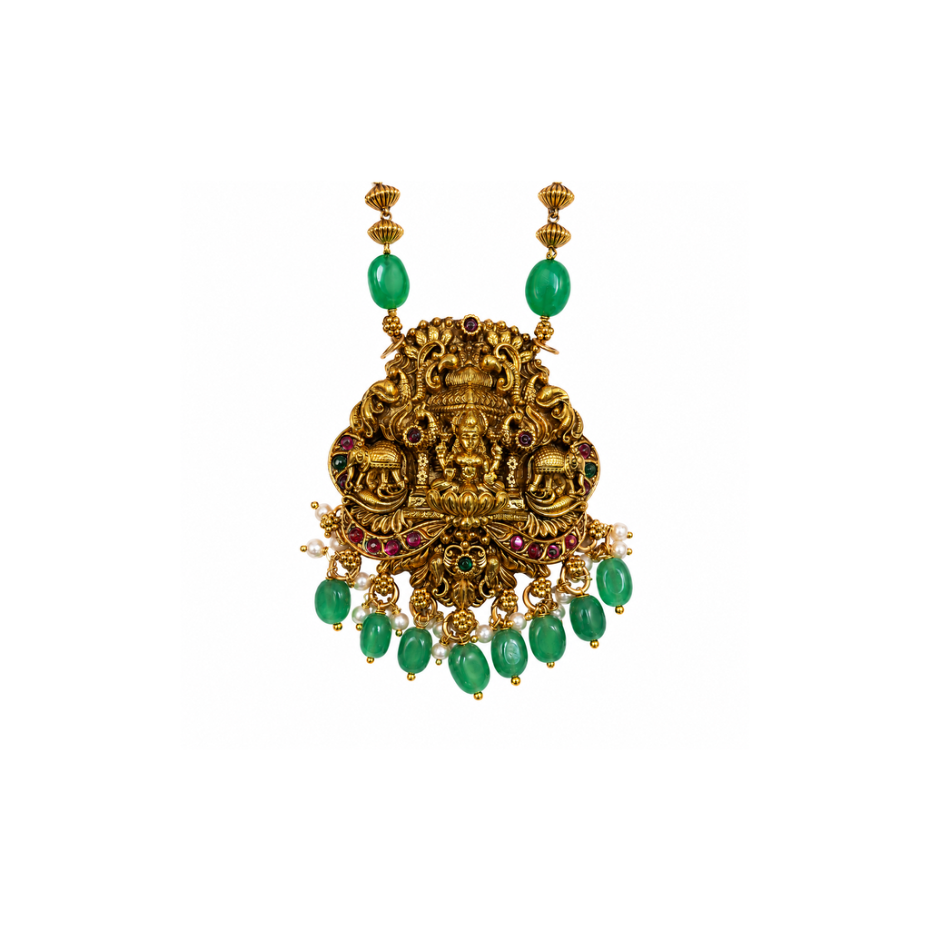 Lakshmi pendant detail with elephant motifs, pink accents and green beads