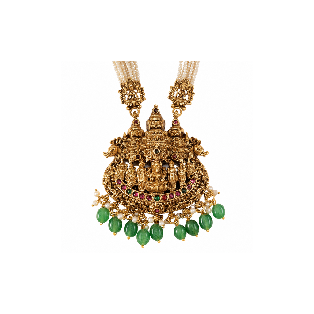 Gold-tone temple pendant detail with deity figures, pink accents and green beads