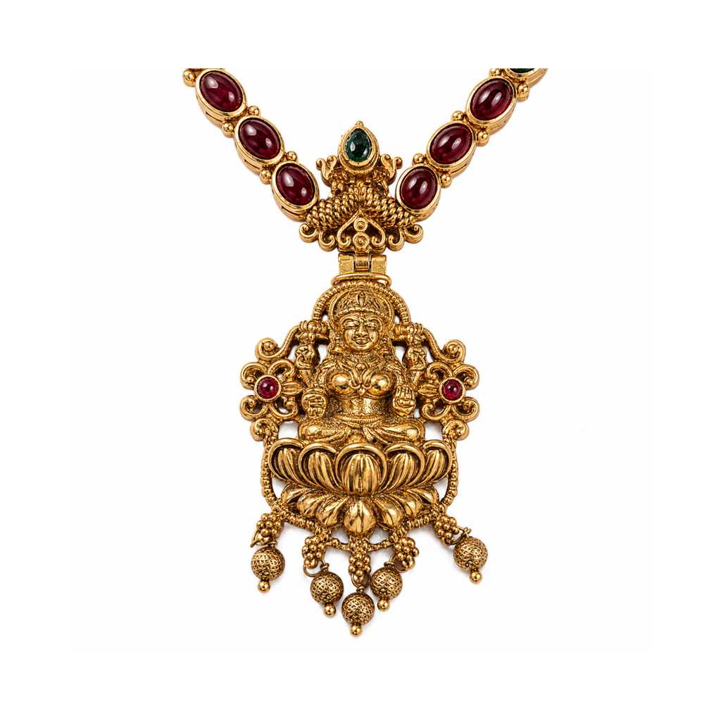 Antique gold-tone Lakshmi-style lotus pendant with ruby and emerald details