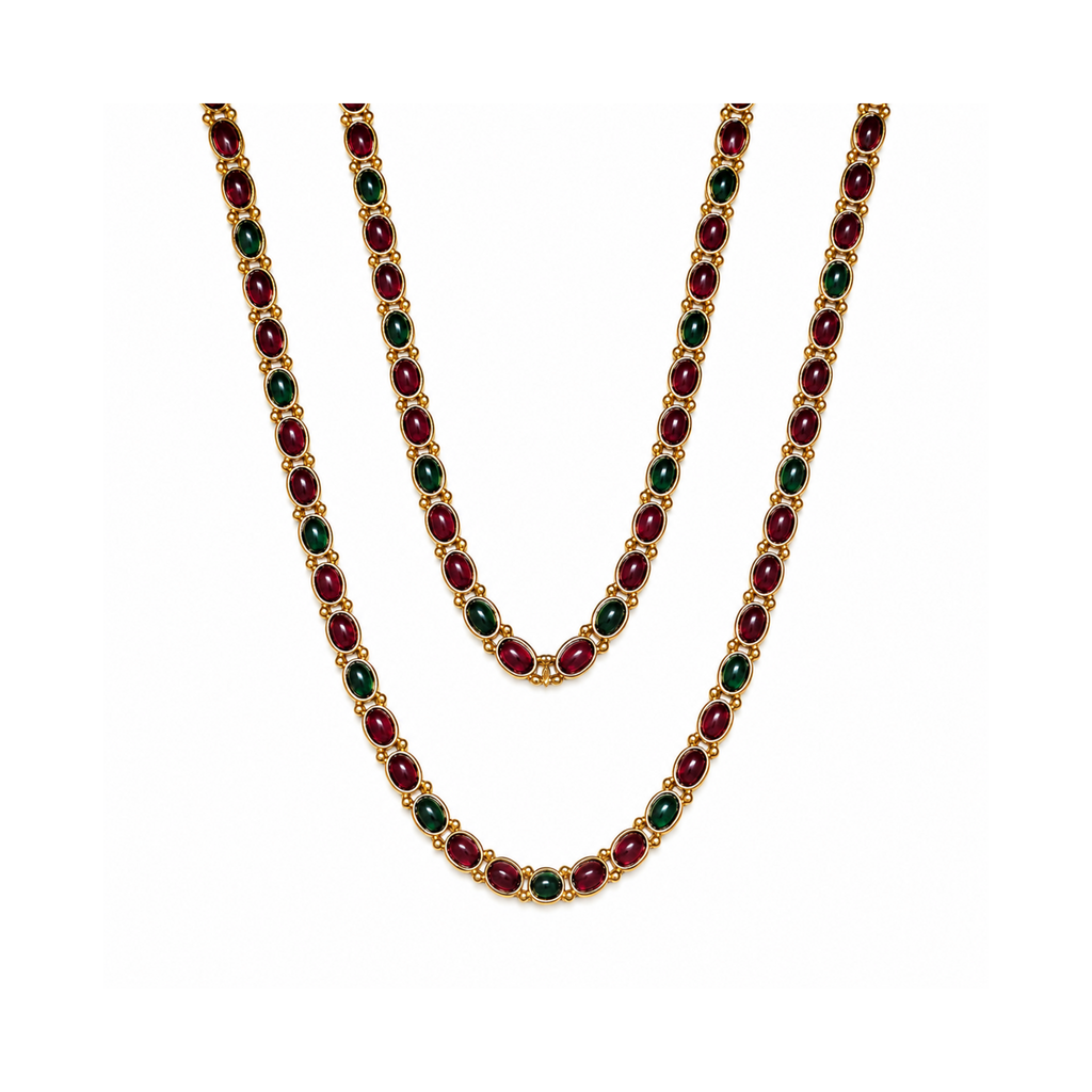 Ruby-red and emerald-green oval stone necklace links on white