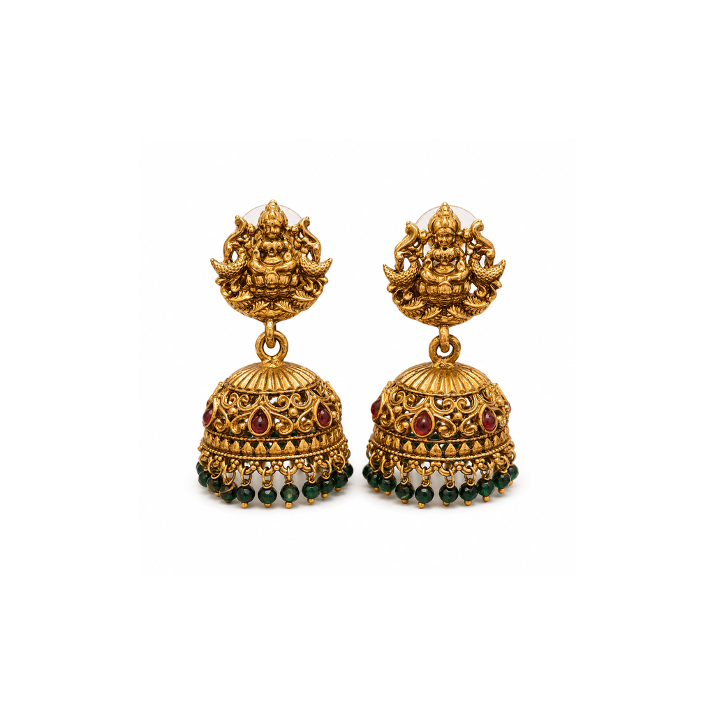 Pair of Lakshmi motif dome jhumka earrings on white