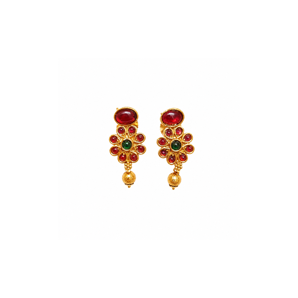 Matching ruby-red and emerald-green floral drop earrings on white